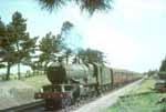 GWR designed Castle class 4-6-0 number 7011 'Banbury Castle'passes the site of Broadway station with the 8.02 Wolverhampton to Ilfracombe 4/7/64 COPYRIGHT John Dagley-Morris